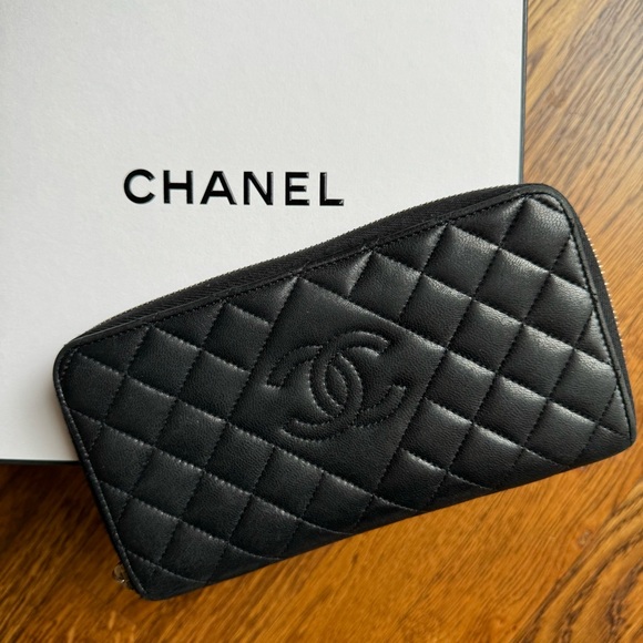 CHANEL Handbags - Chanel 2014 Interlocking CC Quilted Continental Zip Around Wallet